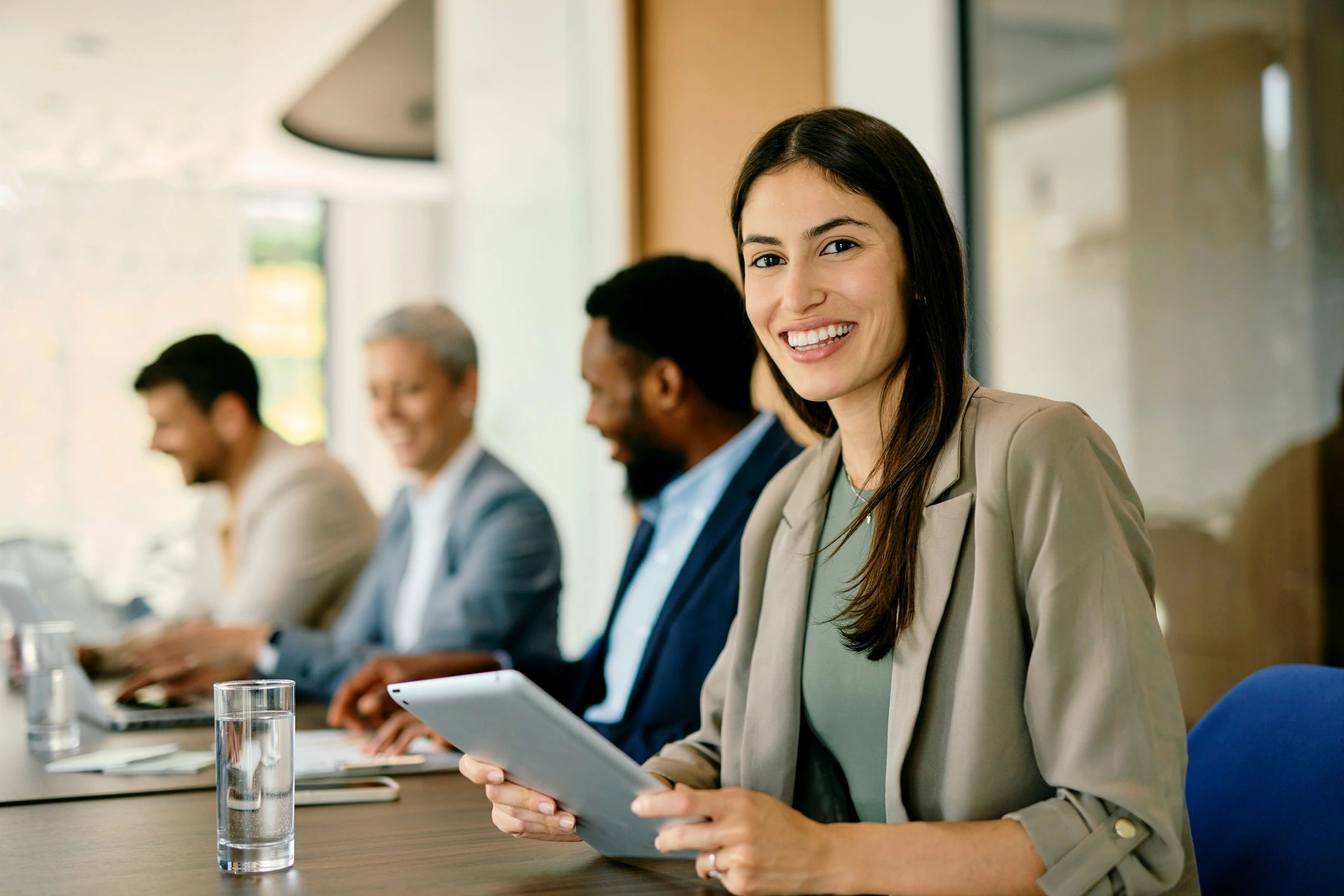 Professional woman smiling during a meeting