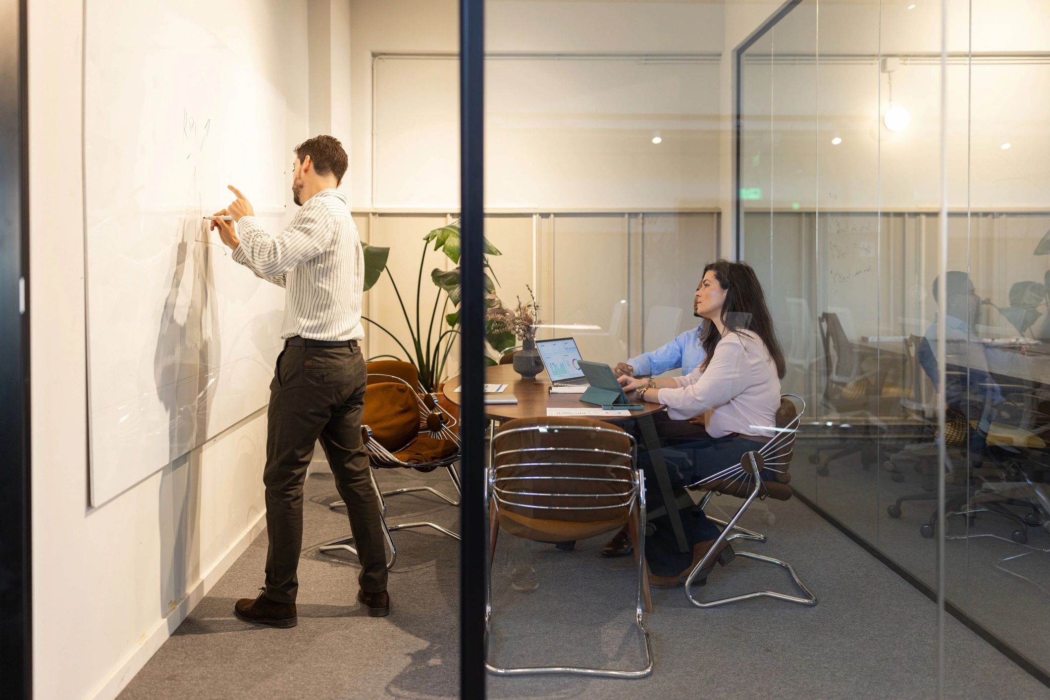 Team brainstorming strategy in a modern office